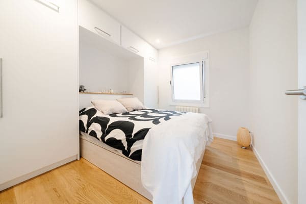 Habitación de matrimonio en reforma integral con afectación estructural en Barcelona
